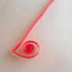 Roll one end of quilling paper.