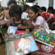 Girls excitedly unpacking their shoeboxes in Sri Lanka.