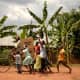 OCC shoeboxes delivered by bike in Uganda.