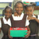 Girls holding a shoebox in St. Vincent.
