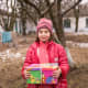 A girl holding her shoebox in Moldova.