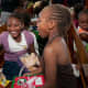 Girls celebrating their OCC shoebox gifts in Belize.