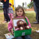 A girl showing off her shoebox in Paraguay.