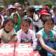Girls ready to open their shoeboxes in Peru.