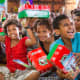 Girls showing off their shoebox gifts in Fiji.