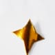 9. Gold star Christmas tree topper