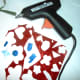 1. Straw (string), scraps of glittered foam paper, glue stick and glue gun