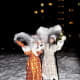 People dressed up as Ded Moroz and Snegurochka.