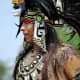 Aztec individual attending a pow wow.
