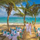 St. Lucia's white beaches are very popular wedding venues . . . 