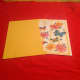 This is the right way to put a folded greeting card in its envelope.