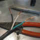 Extension cord wires ready to connect to the light