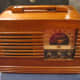 A 1940s radio where the family heard news and listened to the President give updates on the progress of the war.