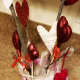 Tuck a piece of festive ribbon into your vase to add whimsy and interest.