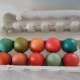 You're all done! A dozen vibrant, dyed eggs are ready for the Easter table.