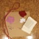 Materials needed for glitter and paper heart wreath