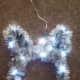 Wrap string lights around your bunny wreath.
