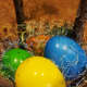 Arrange yarn or Easter eggs and a few eggs around the branches to top off your vase.