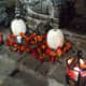 Add bling to white pumpkins, strands of leaves and a couple of lanterns to add light and color to any area of your party.