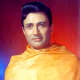 Dev Anand is mistaken as a spiritual saint by villagers.