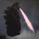 Godzilla flying with his atomic breath