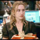 Kate Winslet (Iris) in the office Christmas party scene.