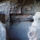 Black stains on the cave wall are evidence of cooking fires.