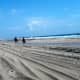Riding horses along the shoreline at Frisco, Cape Hatteras National Seashore, NC Outer Banks