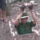 Demonstration on entering the Cu Chi tunnels in Vietnam