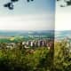 Two photos pieced together showing Herrenberg &amp; landscape below the Alten Rain (forested area) which was high above.
