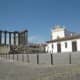 Roman temple in Evora to the left and a museum to the right