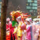 Rain or shine, the festival will go on! And the street vendors make a fortune out of selling those rain ponchos.