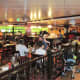 O'Sheehan's Neighborhood Bar and Grill is a full service restaurant that is open 24 hours per day.