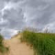Storm watching over the 40 foot dune between the two main parking lots at Oval Beach, Lake Michigan.
