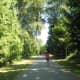 A jogger runs along the trail
