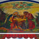 Close-up detail of a mural (painted by Father Gielen) above the church's main entrance.