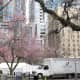 Cherry blossoms and movie vehicles outside the Vancouver Art Gallery