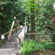 The bridge over Deer Lake Brook leads to the village.