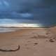 The Sandy beaches of Beadnell Bay under an evening sky