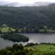 Grasmere Lake. We hired a boat and rowed around the island and then climbed up to admire the view from a hillside, where daffodils were growing in abundance.