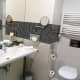 The sink and toilet area.
