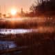 Sunrise over a frozen marsh along Lake Huron at Bay City State Park - Bay City, Michigan