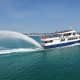 Star Line Mackinac Island Hydro-Jet Ferry Marquette II leaving the Mackinaw City Dock to Mackinac Island, Michigan