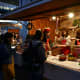 Revelers queuing to buy hot yuzu drinks.