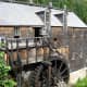 The grist mill and water wheel.