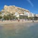 Santa Barbara Castle looms over Postiguet beach.