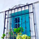 Beautiful turquoise window facing the street.
