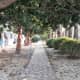 Shaded paths by the villas.