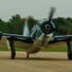 Helldiver after landing and starting to fold its wings. 