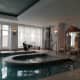 The jacuzzi with rowing machine behind.